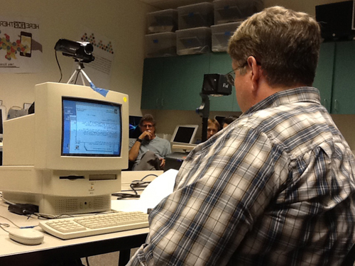 McDaid using a computer to view the Funhouse